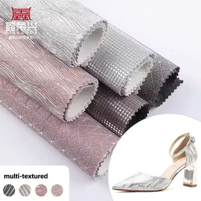 Elastic PU Embossed Sparkly Shiny Glitter Fabric Couro sintético para sapatos Bolsas de arco Artesanato Chapéu Tecido de couro falso