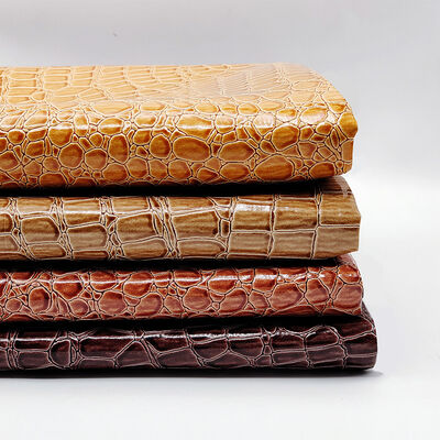 Promoção Quente PVC Couro Sintético Brilhante de Alto Brilho com Padrão de Pedra Embutido para Uso em Sapatos, Bolsas, Cadernos e Móveis